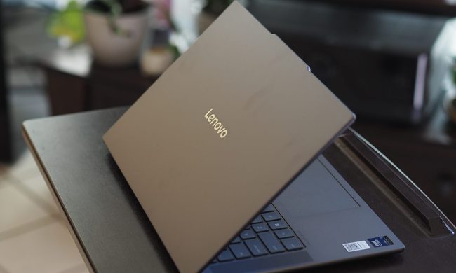 Lenovo Yoga Slim 7i Aura Edition rear view showing lid and logo.