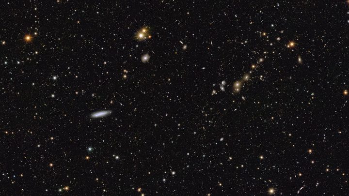 This image shows an area of the mosaic released by ESA’s Euclid space telescope on 15 October 2024. The area is zoomed in twelve times compared to the large mosaic. In the middle left, spiral galaxy NGC 2188 is visible edge-on at a distance of 25 million light-years. In the top right corner, galaxy cluster Abell 3381 is now clearly noticeable, 678 million light-years away from us.