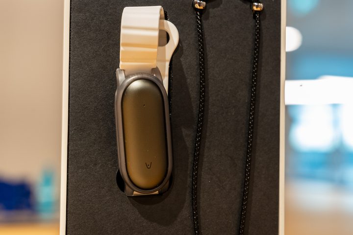 Plaud NotePin in wrist strap close up