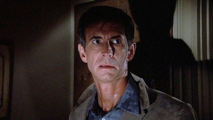 A worried Norman Bates looks away in Psycho II.