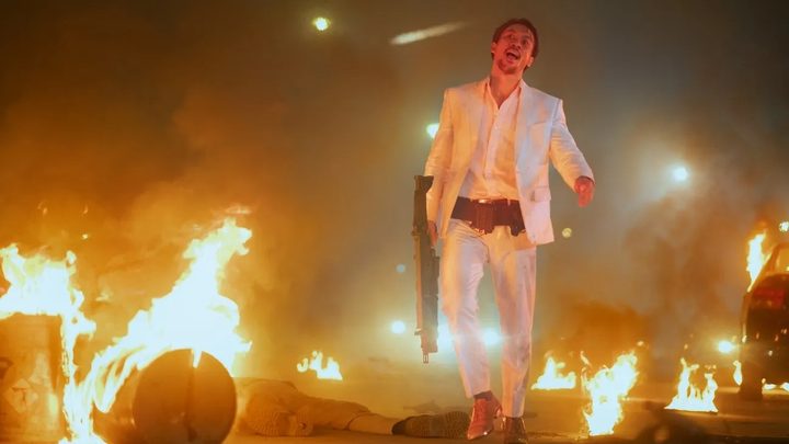 A man walks through fire in The Shadow Strays.