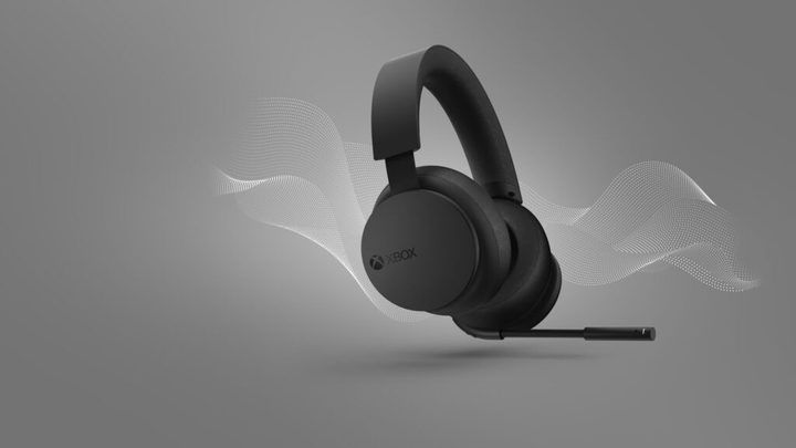 A new black Xbox headset floating on a gray background.