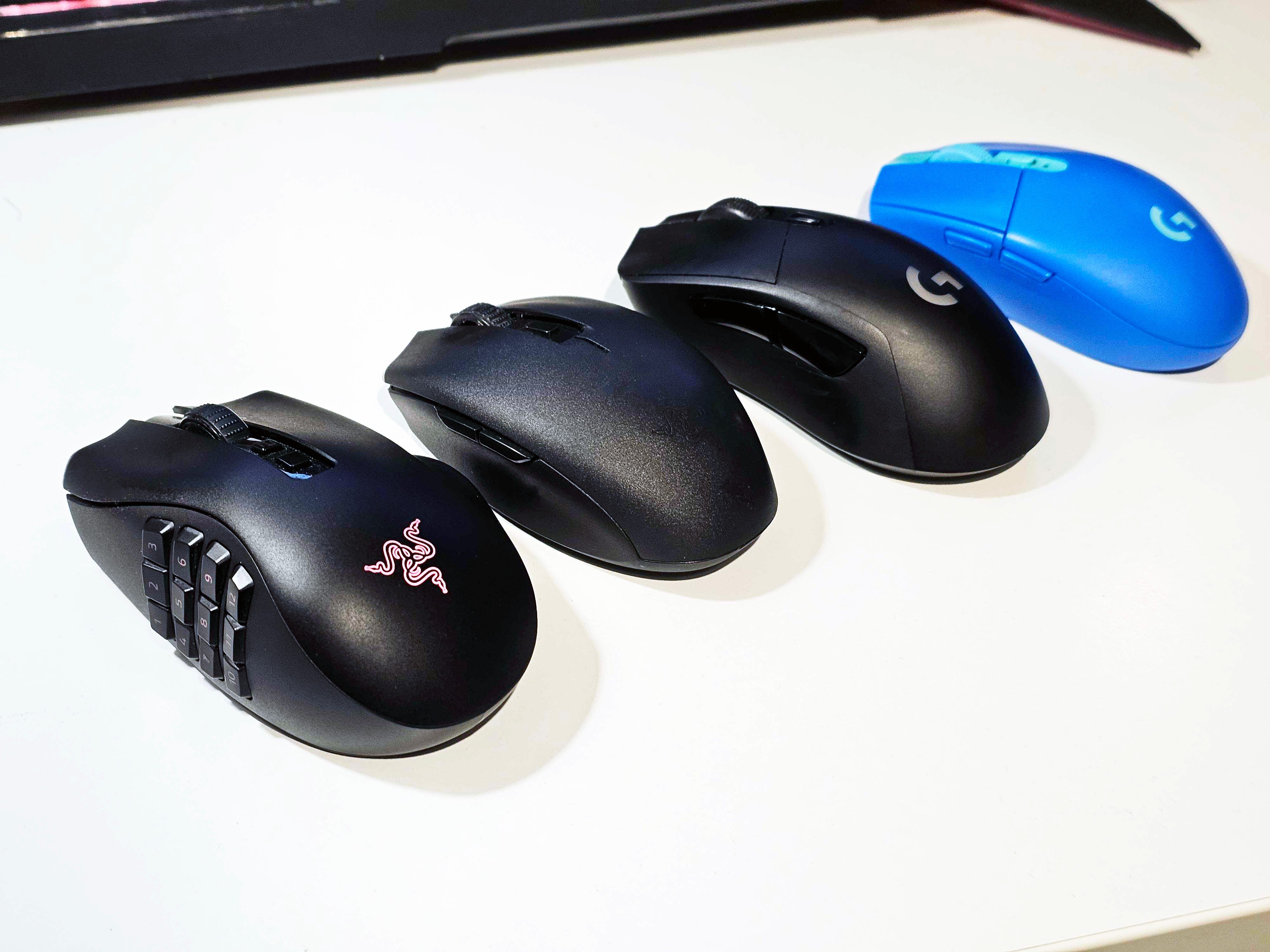 Four gaming mice, side-by-side.