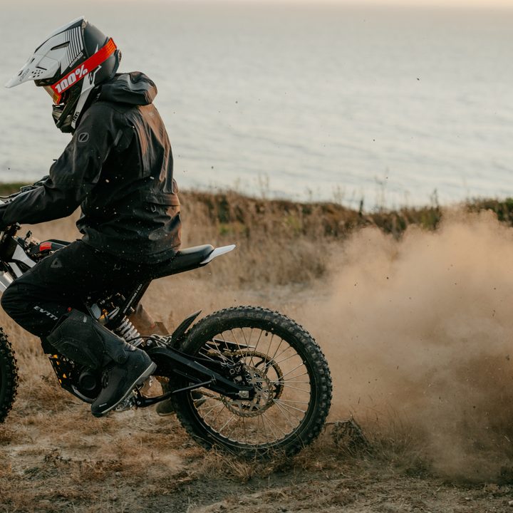 A rider kicking up dust on a 2025 Zero Motorcycle XB.