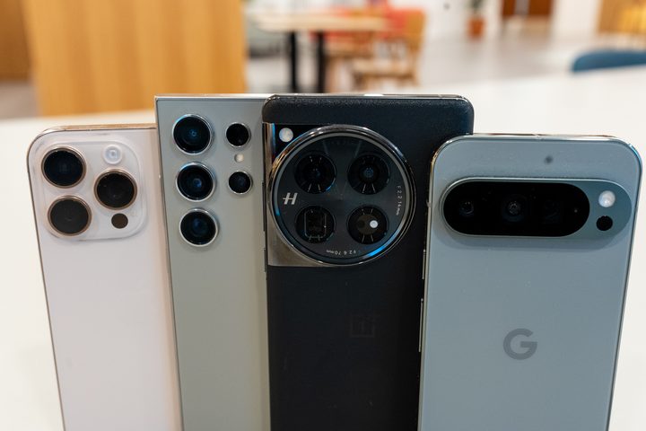 Close up photo of the cameras on the iPhone 16 Pro, Galaxy S24 Ultra, OnePlus 12 and Pixel 9 Pro