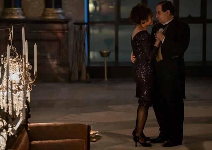Carmen Ejogo and Colin Farrell dance together in The Penguin.