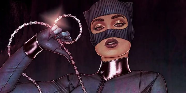 Catwoman holds a whip in a DC comic book.
