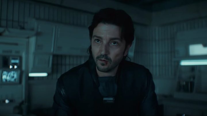 A man stares and looks with a confusing face.