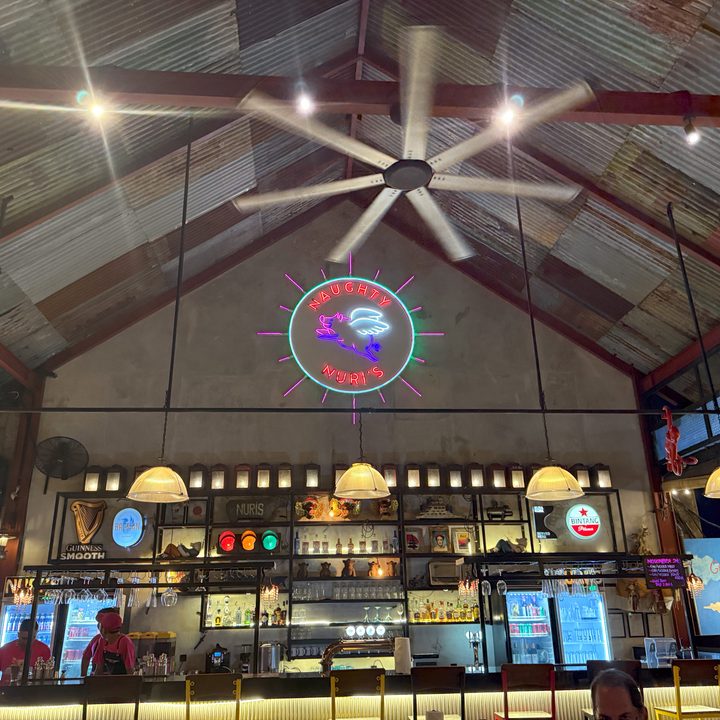 A lowlight restaurant photo captured on the iPhone 16 Pro