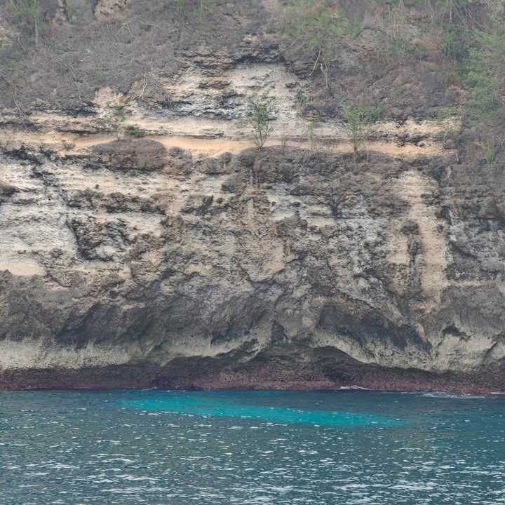 A picture of a cliff face on an island captured on the Find X8 Pro