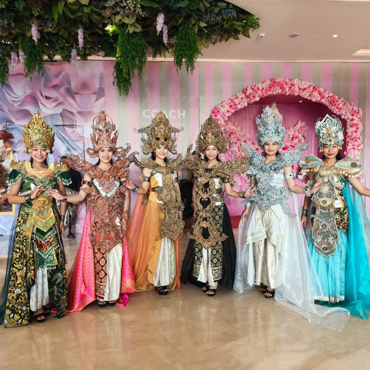 Six women dressed up in a performance captured on the Find X8 Pro