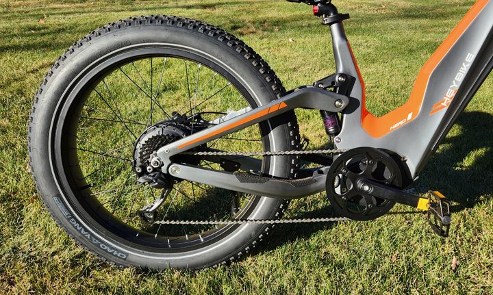 HeyBike Hero e-bike right profile view of the bikes chain, gearset, rear hub motor, and Horst 4-bar rear suspension.