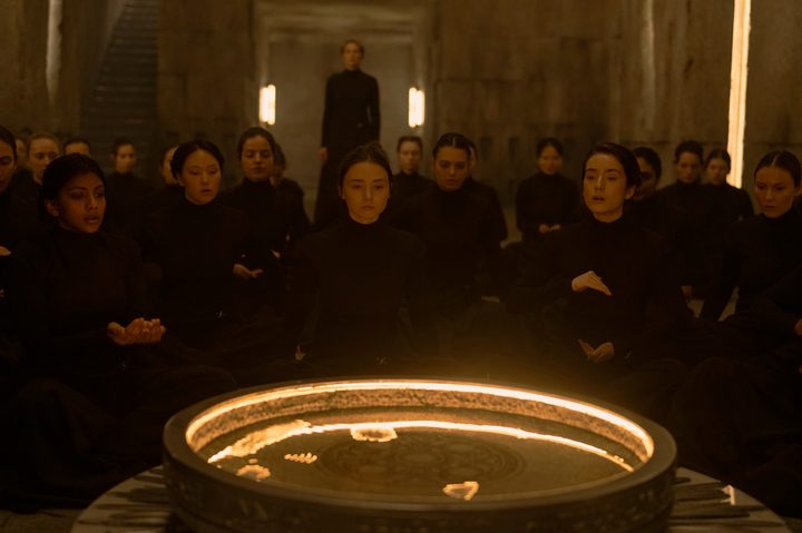 Jessica Barden and Emma Canning sit around a singing bowl in Dune: Prophecy.