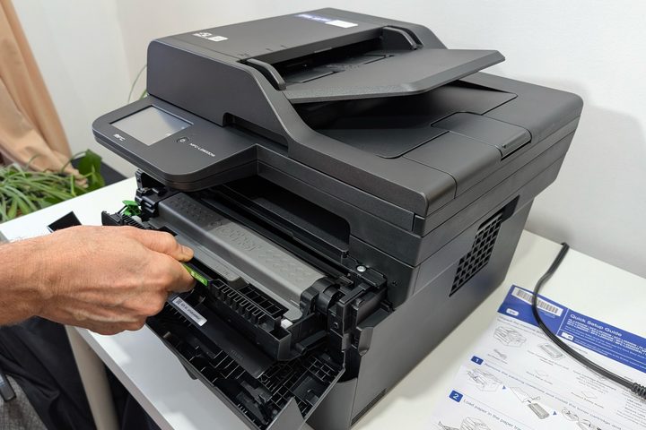MFC-L2900DW setup was quick and Brother includes a starter toner cartridge.