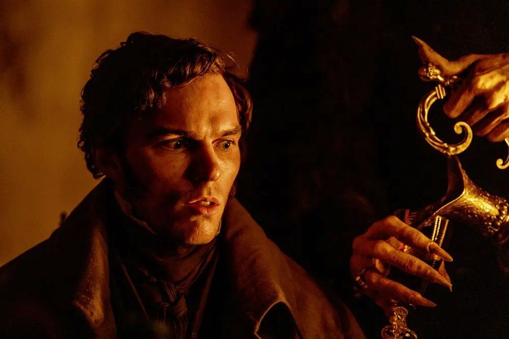 A man looks at a hand in "Nosferatu."