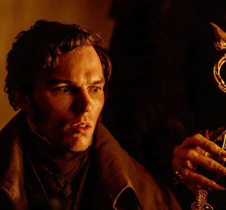 A man looks at a hand in "Nosferatu."