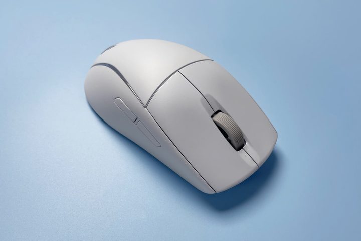 The Corsair M75 for Mac mouse against a blue background.