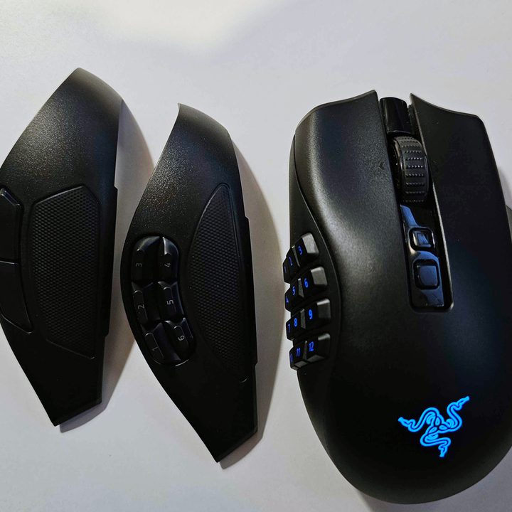 The Razer Naga V2 Pro gaming mouse on a white background, along with two swappable side plates.