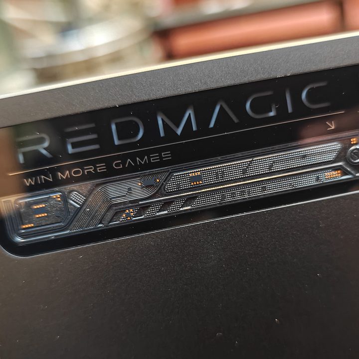 Glass strip with LED branding on Red Magic Nova gaming tablet.