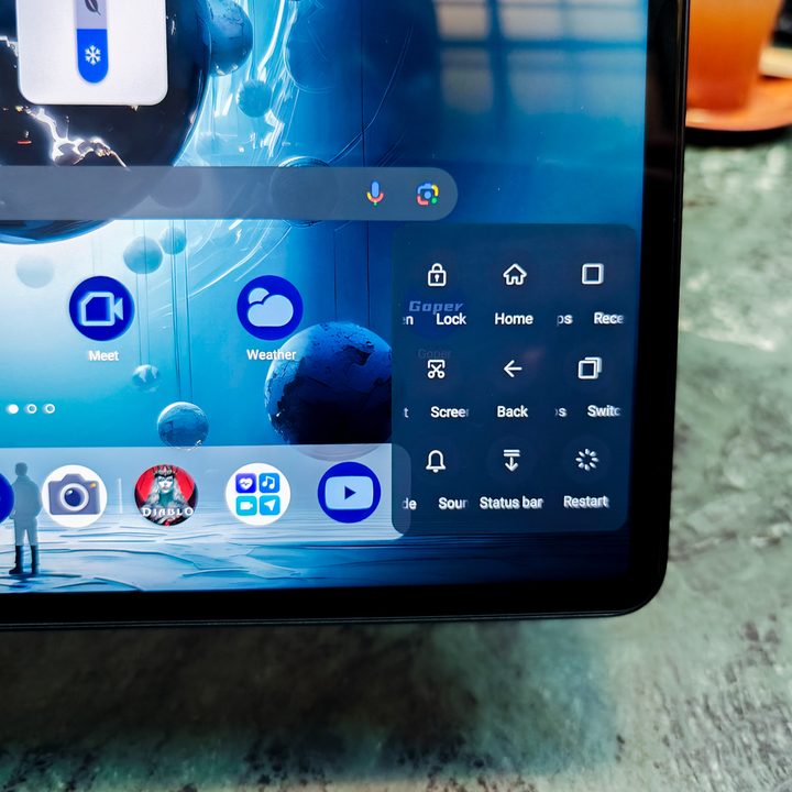 iPad mini display compared with Game plugins inside game space on Red Magic Nova gaming tablet.