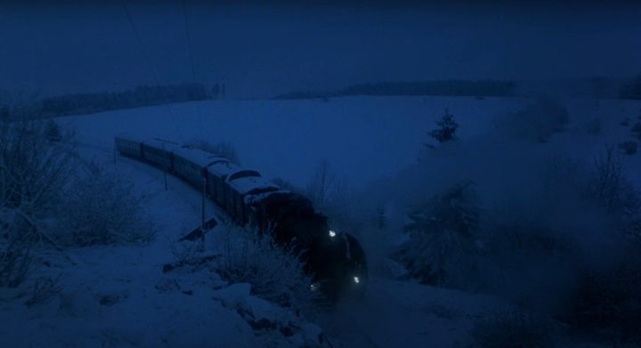 A train trapped in a snow-filled field in "Murder on the Orient Express."