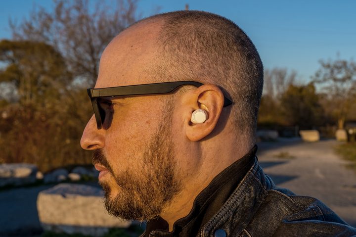 Side profile wearing the Sony WF-C510 earbuds.