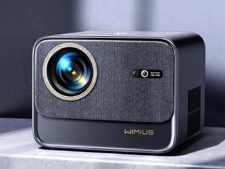The Wimius smart 4K projector on a desk.