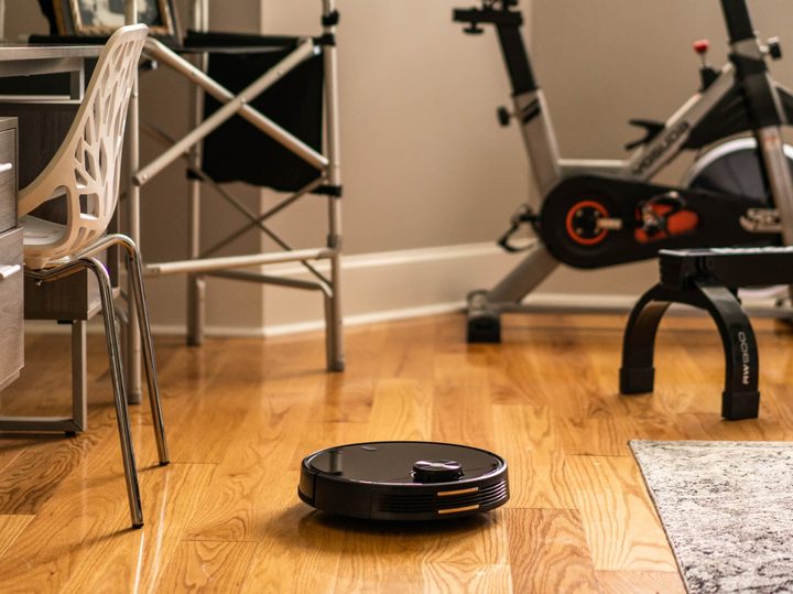 Wyze Robot Vacuum navigating home with furniture nearby