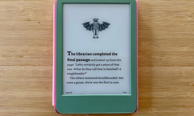 Tap the top of the screen of your Kindle to bring up the menu interface.