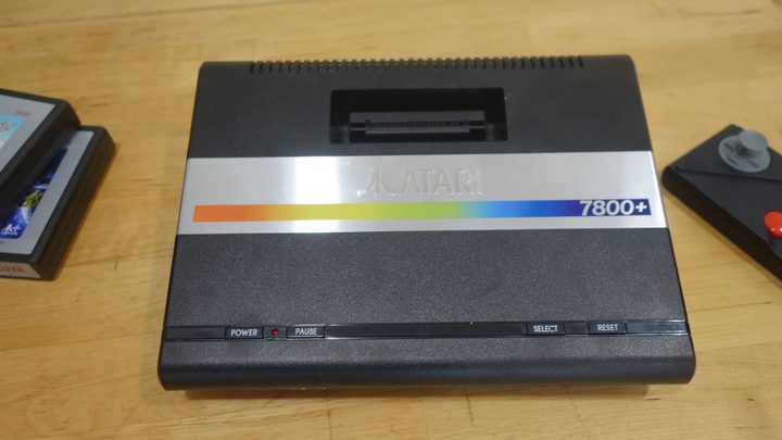 An Atari 7800+ sits on a table.