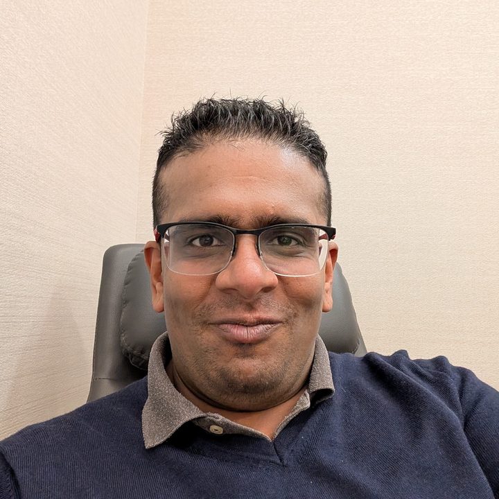 neutral background selfie captured on the Pixel 9 Pro.