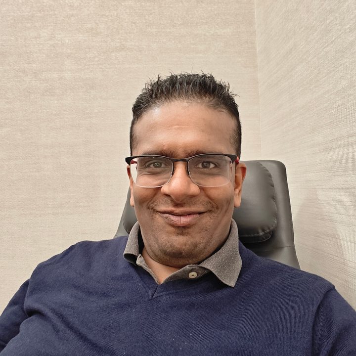 neutral background selfie captured on the OnePlus 12.