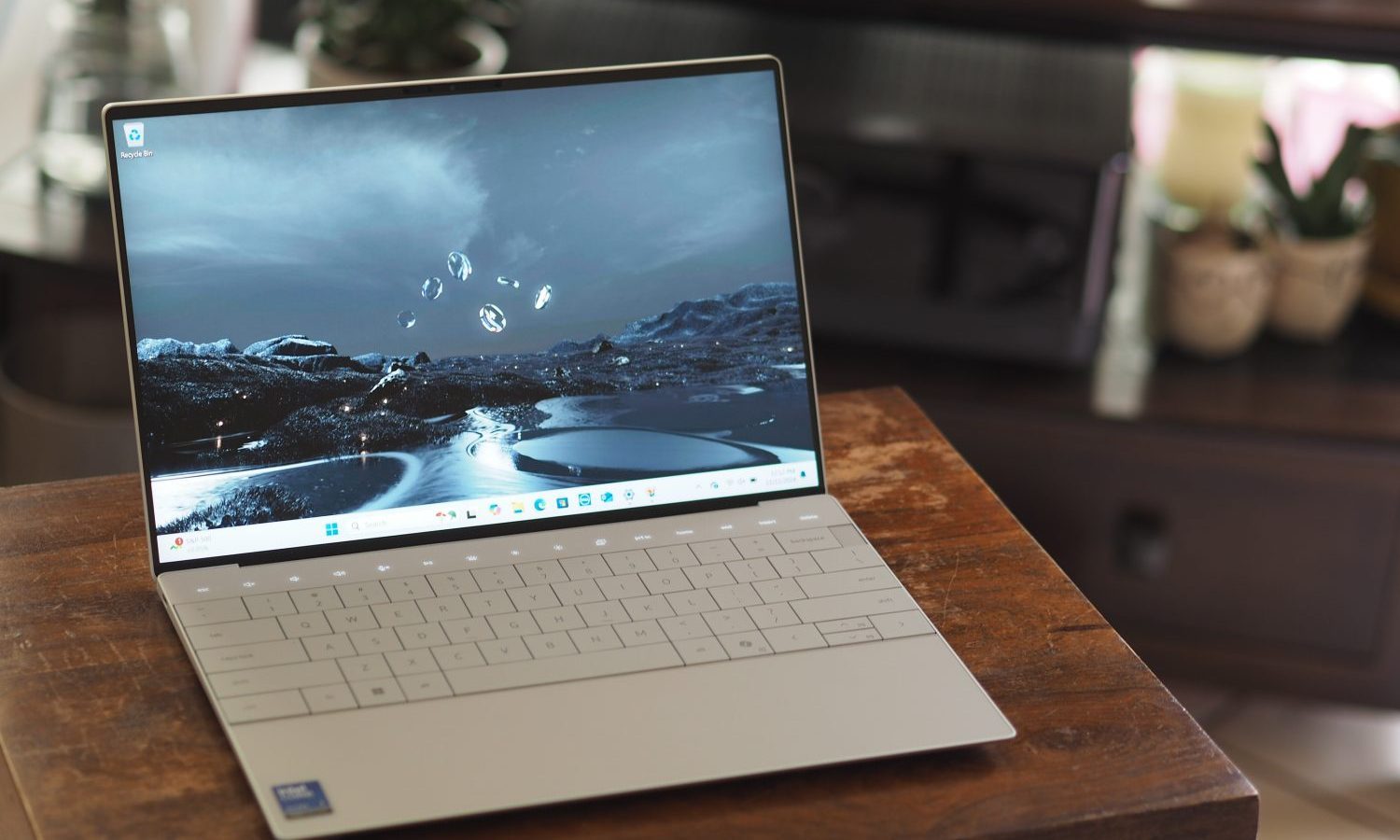 Dell XPS 13 9350 front angled view showing display and keyboard.