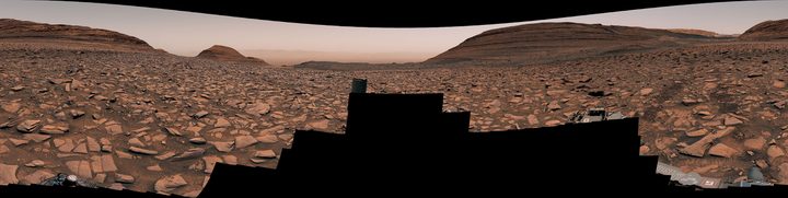 NASA’s Curiosity captured this panorama using its Mastcam while heading west away from Gediz Vallis channel on Nov. 2, 2024, the 4,352nd Martian day, or sol, of the mission. The Mars rover’s tracks across the rocky terrain are visible at right.