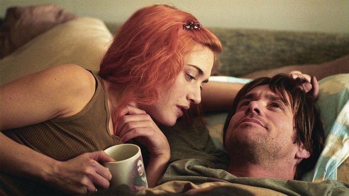 Kate Winslet and Jim Carrey cuddling together in a bed in "Eternal Sunshine of the Spotless Mind."