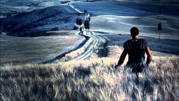 A man walks in a field of wheat in Gladiator.