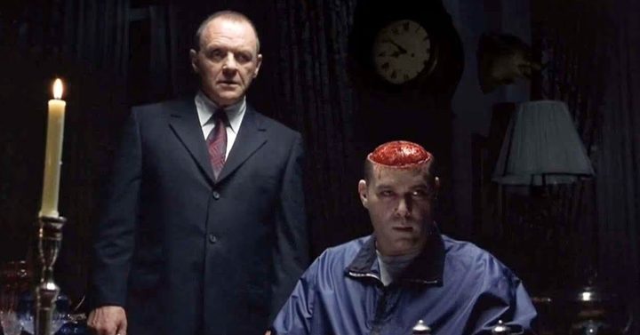 A man stands next to another man in Hannibal.