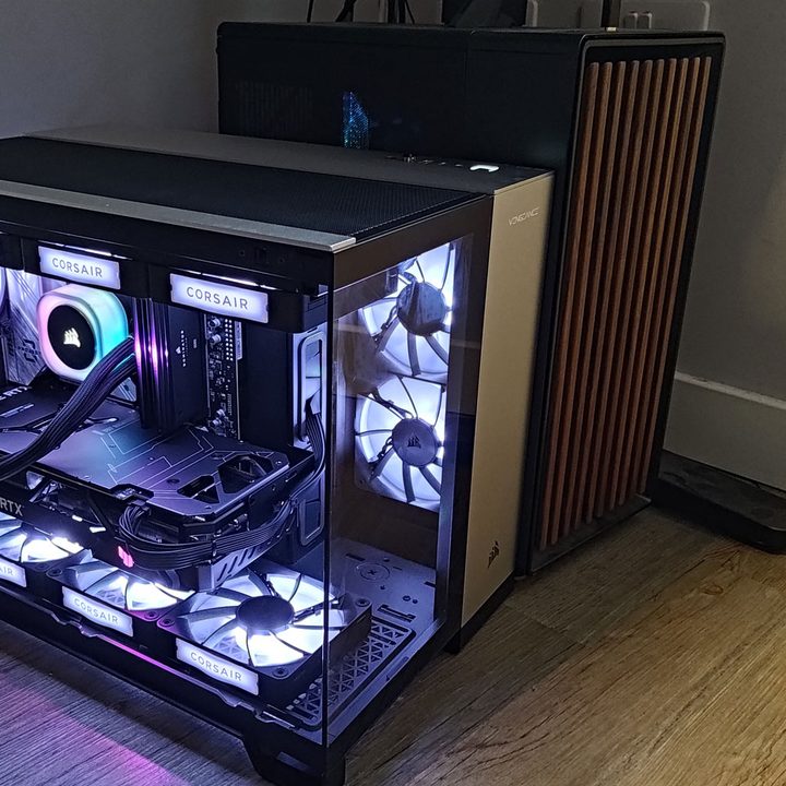 Corsair Vengeance PC next to a custom gaming PC.