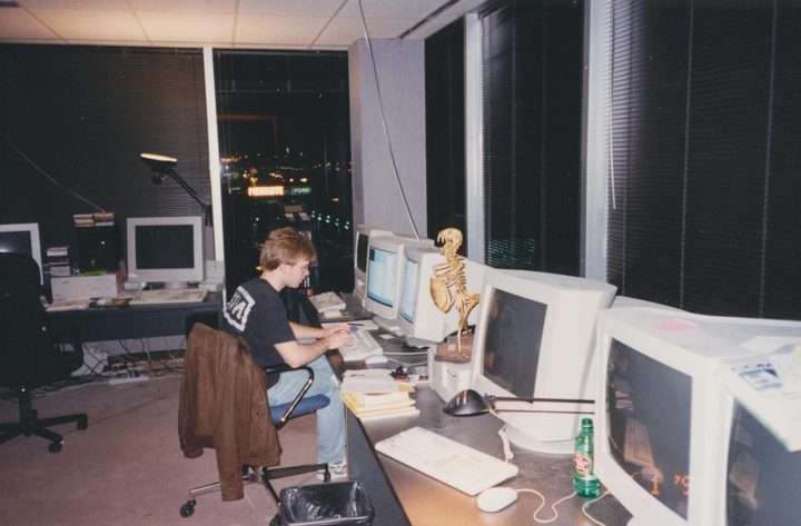 John Carmack working on Quake in the id Software offices.