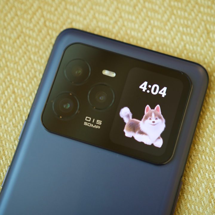 The rear screen on the Lava Agni 3, showing the time and a cute dog.