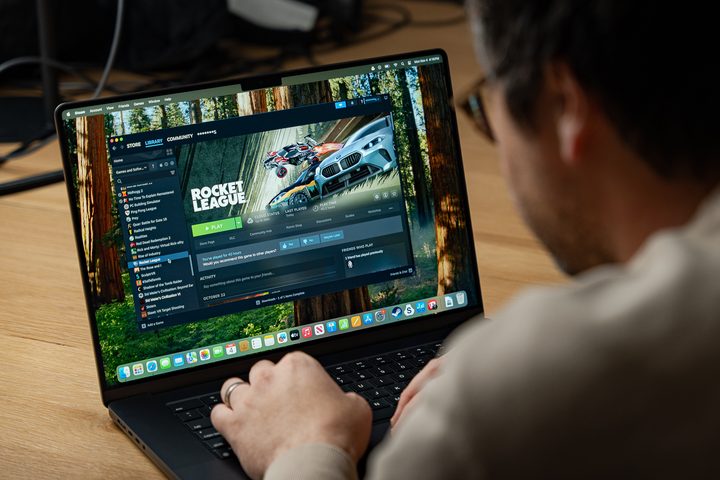 A person running Steam on the M4 MacBook Pro. Rocket League is up on the screen