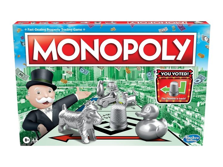 The Monopoly board game packaging against a white background.