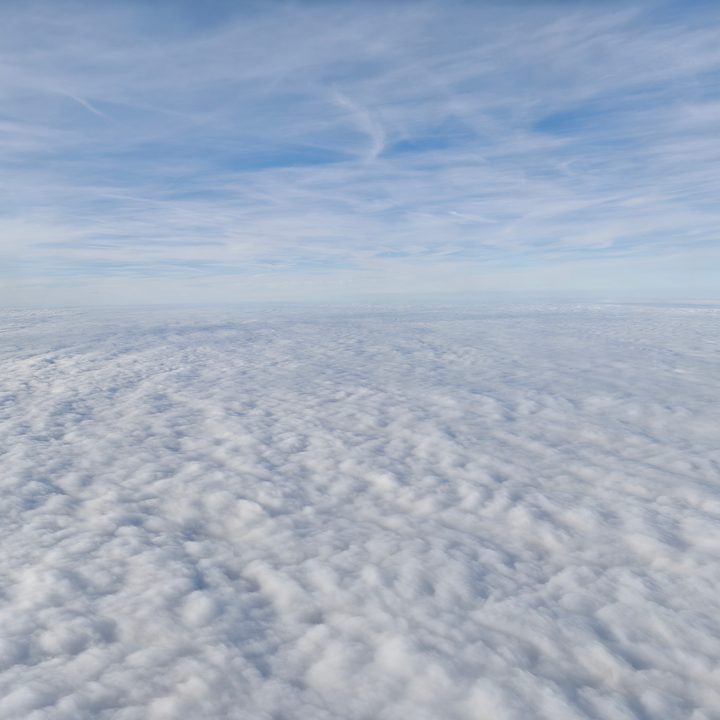 A photo of the clouds and the sky as viewed from an airplane, taken with the Oppo Find X8.