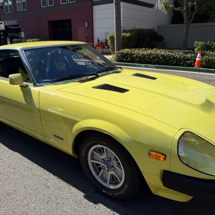 Yellow Pikachu themed car.