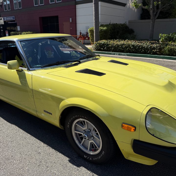 Yellow Pikachu themed car.