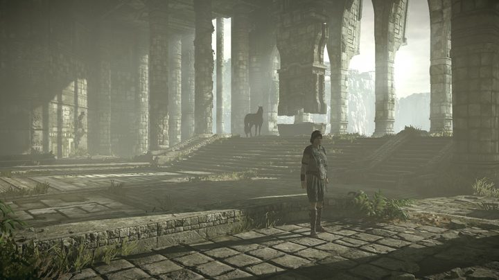 The hero of Shadow of the Colossus stands in a temple.
