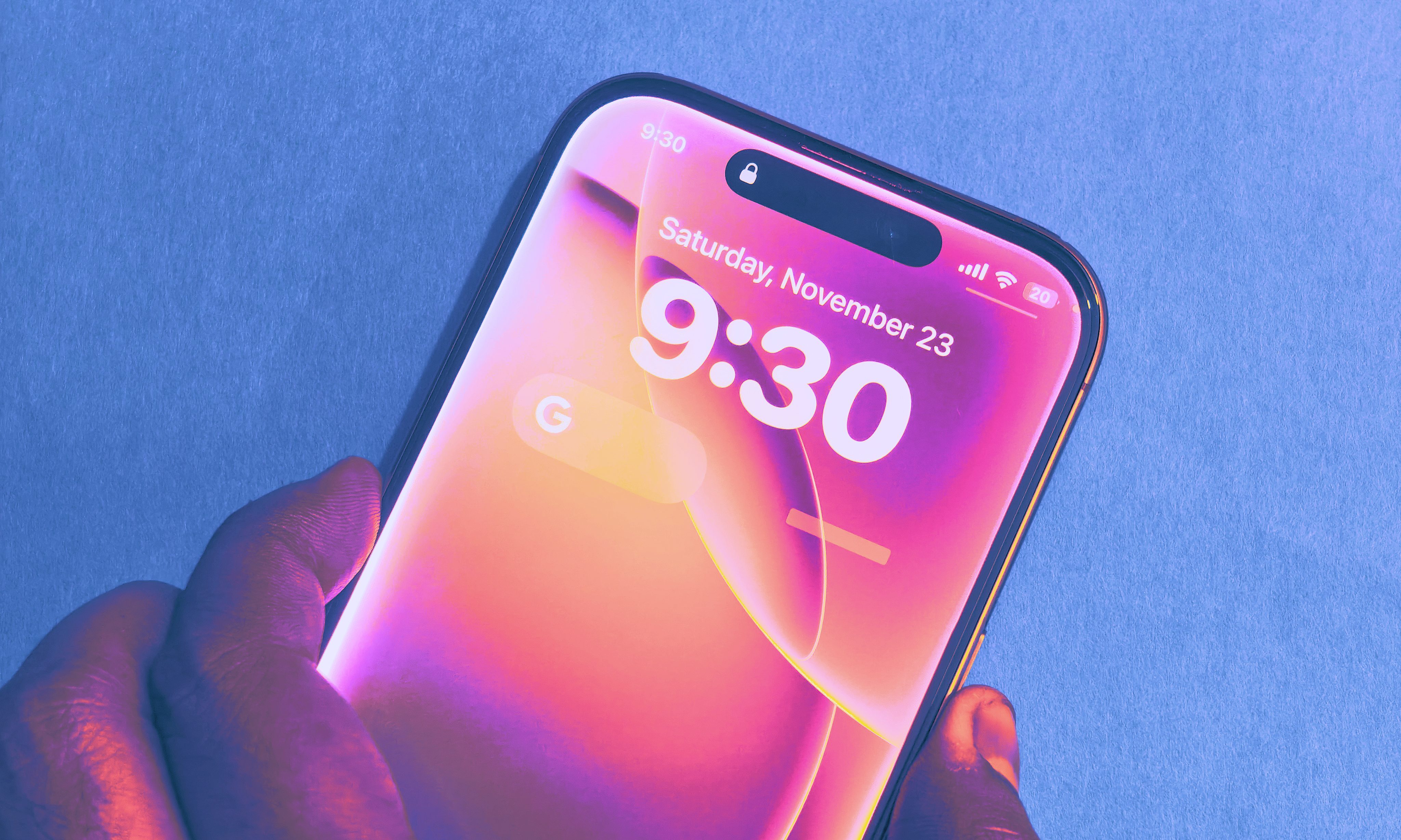 Pulling up Siri on lock screen of iPhone.