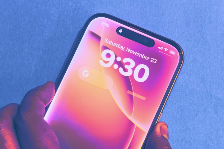 Pulling up Siri on lock screen of iPhone.