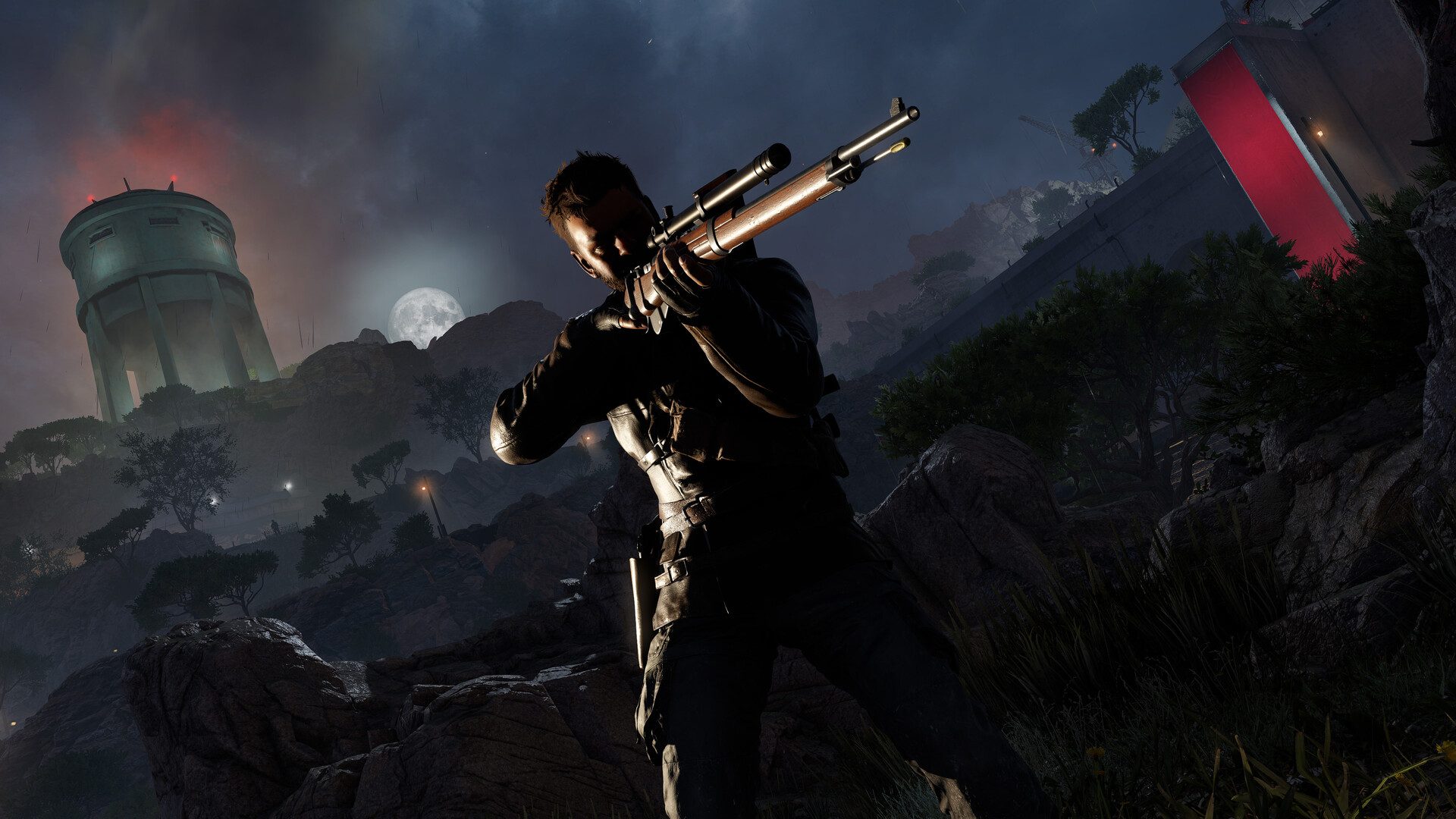 En Sniper Elite: Resistance, un francotirador empuña un arma por la noche.