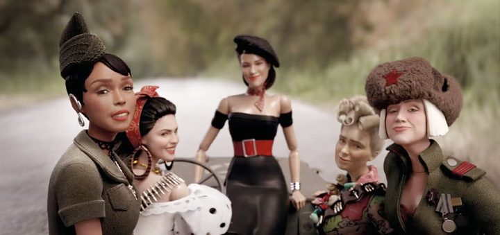 Five female puppets relax on a boat in Welcome to Marwen.